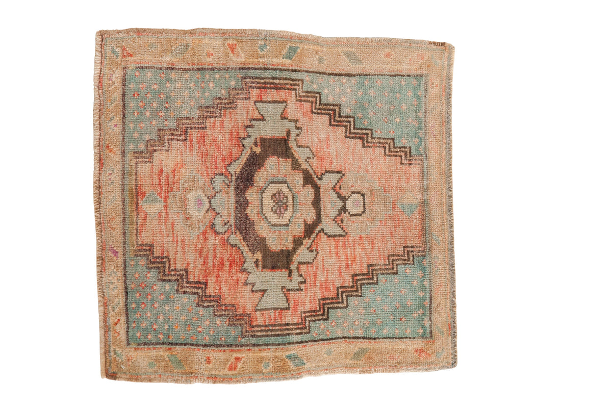 Distressed Oushak square rug with faded melon and denim blue medallion, 2'5" x 2'5".