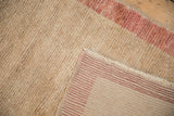 Distressed vintage Tulu rug's soft wool pile with its striped hand-knotted reverse.