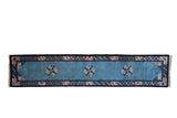 Vintage Peking rug runner with three roundel medallions on a sky blue field and a dark cobalt blue border.