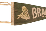 Illustration of a woman in a sun hat on the green felt of a vintage Bradley Beach pennant.
