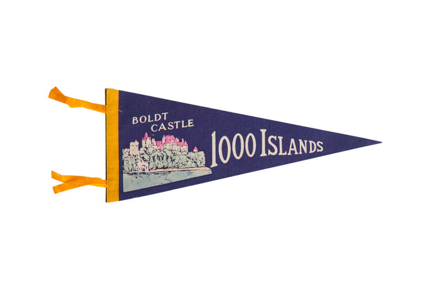 Vintage Boldt Castle 1000 Islands felt flag pennant in blue with a pink and white graphic.