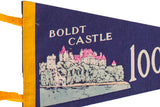 Angled view of the Boldt Castle graphic on the vintage dark blue felt pennant.