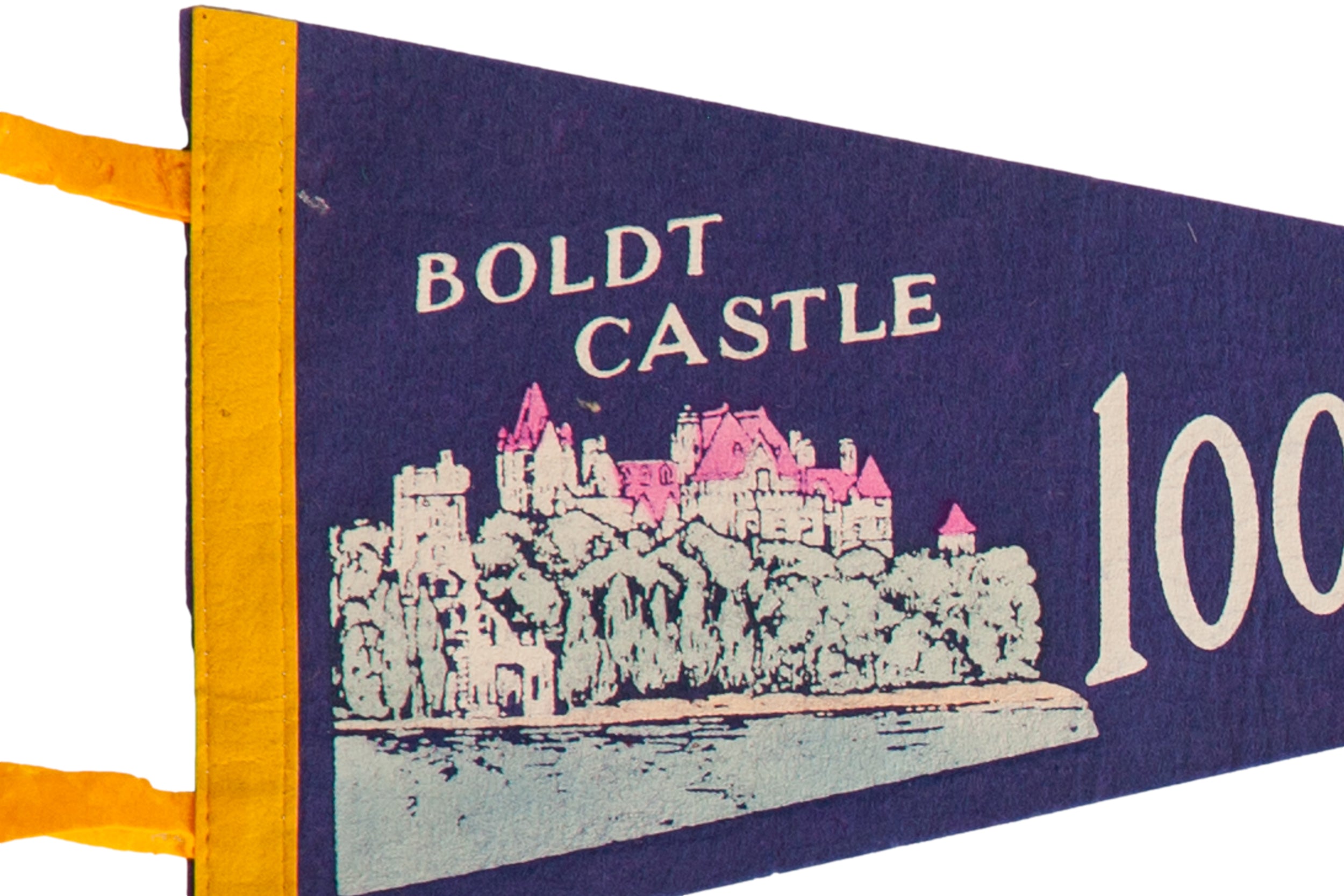 Angled view of the Boldt Castle graphic on the vintage dark blue felt pennant.