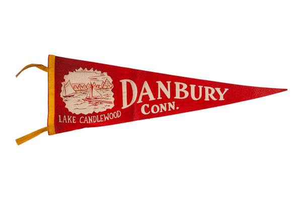 Vintage Lake Candlewood pennant in red felt with an off-white sailboat graphic and yellow ties.