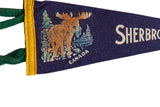 Yellow felt border and moose graphic on a vintage Sherbrooke, Canada souvenir pennant.