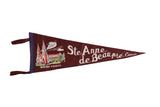 Vintage Sainte Anne de Beaupre maroon felt pennant with white script and a colorful basilica graphic.