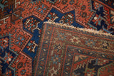 The hand-knotted foundation and secured end of a vintage Persian Karaja rug.
