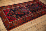 Rust red Turtle samovar border and navy field with geometric tendrils.