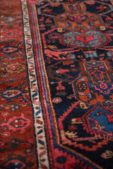 Turtle samovar main border and geometric florals in red, sky blue on navy field.