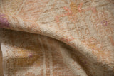Soft, time-worn texture of a distressed Oushak rug showing even wear across the knot heads.