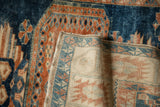 Hand-knotted construction and finished selvage on the reverse of a vintage Turkish Oushak rug.