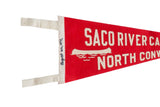 Detail of the vintage pennant's white felt ties and handwritten 1971 date in ink.