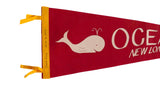Golden yellow header of a vintage felt pennant with handwritten 