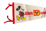 Handwritten date of May 14, 1975 beside Mickey Mouse on an ivory felt pennant.