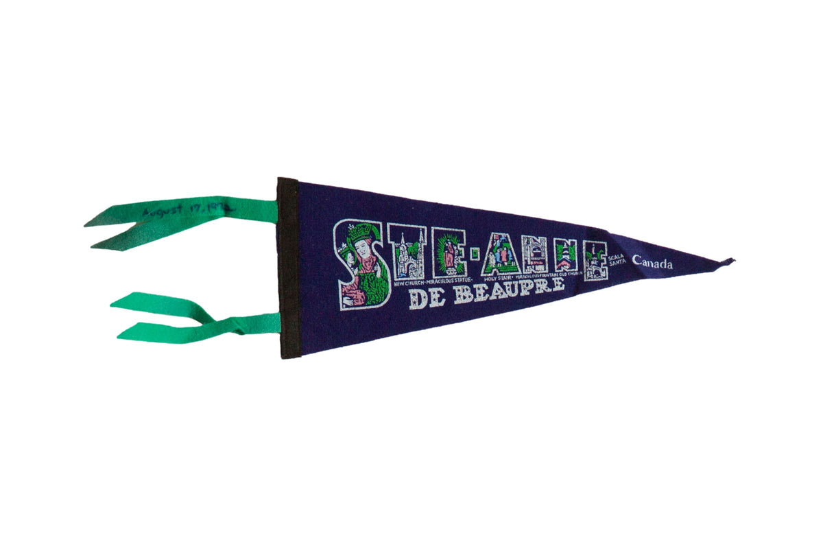 Vintage Sainte Anne De Beaupre navy felt pennant with illustrated white lettering and green ties.