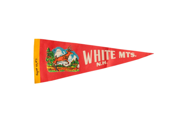 Vintage red felt pennant for the White Mountains with a colorful illustration of a leaping buck.