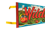 Close-up on the vintage felt pennant's red gondola illustration and handwritten date from 1971.