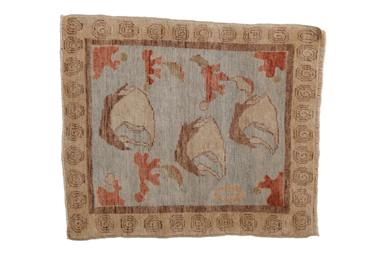 Modern Oushak square rug with powder blue field, repeating floral motifs, spiral border, 2'8