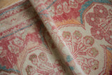 Vintage distressed Dargezine rug pile, with abrash, cinnabar, ivory, teal floral detail.
