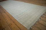 Linear geometric patterned distressed Turkish Kilim runner with subtle raised texture.