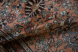 Vintage Persian Mehreban rug, intricate floral and vine pattern in dusty copper, denim, burgundy tones.