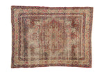 Antique Kerman rug, central starburst medallion on ivory ground, thousand flower field in red, navy.