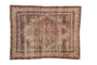 Antique Kerman rug, central starburst medallion on ivory ground, thousand flower field in red, navy.