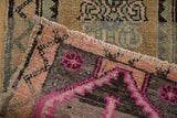 Distressed texture with vibrant magenta starburst floral and muted geometric patterns.