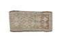 Distressed vintage Oushak rug mat runner with pale coffee brown floral guls and green accents.