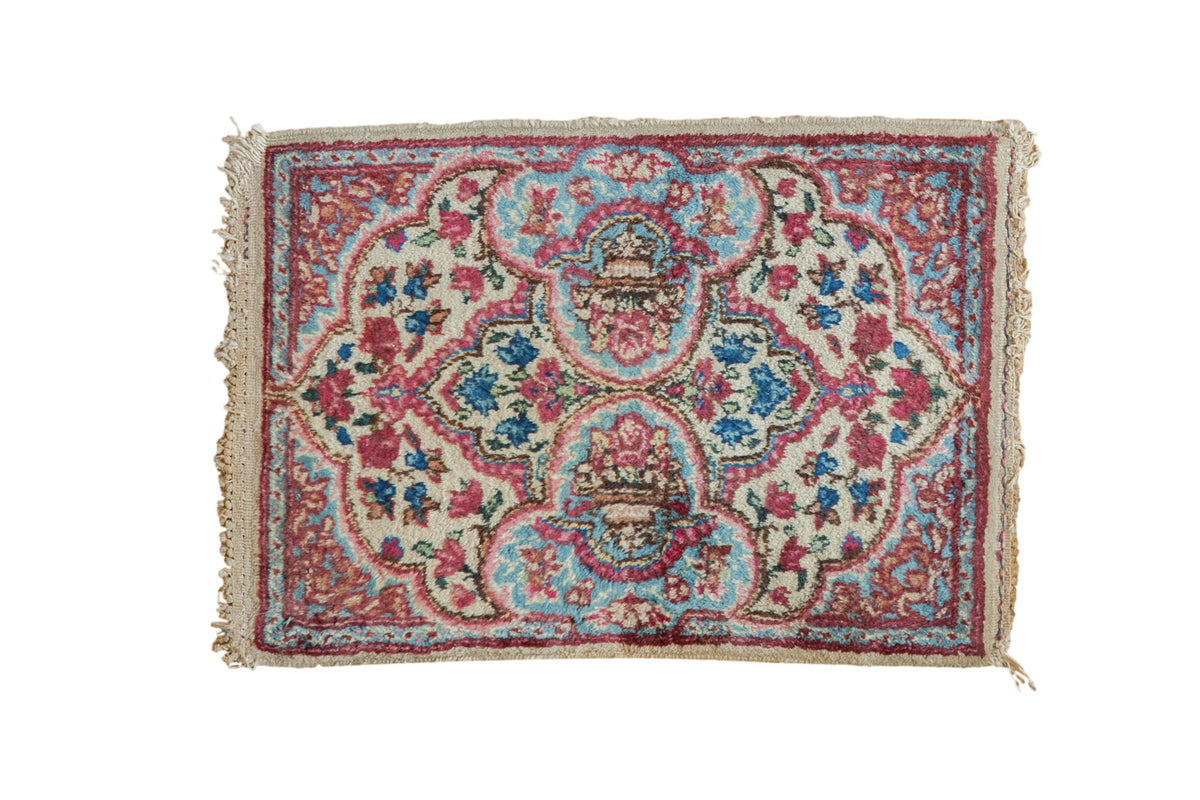 Unusual vintage Kerman mat featuring ivory, cochineal red, powder blue floral samovar motifs, 1'6" x 2'2".