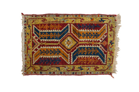 Antique Anatolian rug mat, brick red, geometric medallion with serrated leaves, saffron border, 1'10" x 2'9".