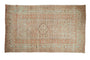 Distressed Anatolian rug with soft blush, coffee, and slate blue medallion pattern, 4'6" x 7'5".