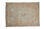 Hand-knotted Distressed Vintage Oushak rug with muted taupe, faded mint, and peach geometric patterns.