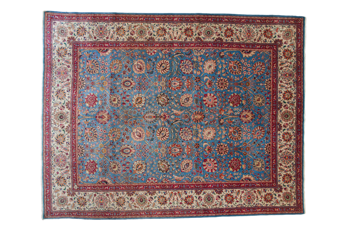 Vintage Persian Tabriz carpet, aqua blue field with allover floral palmette vase design.