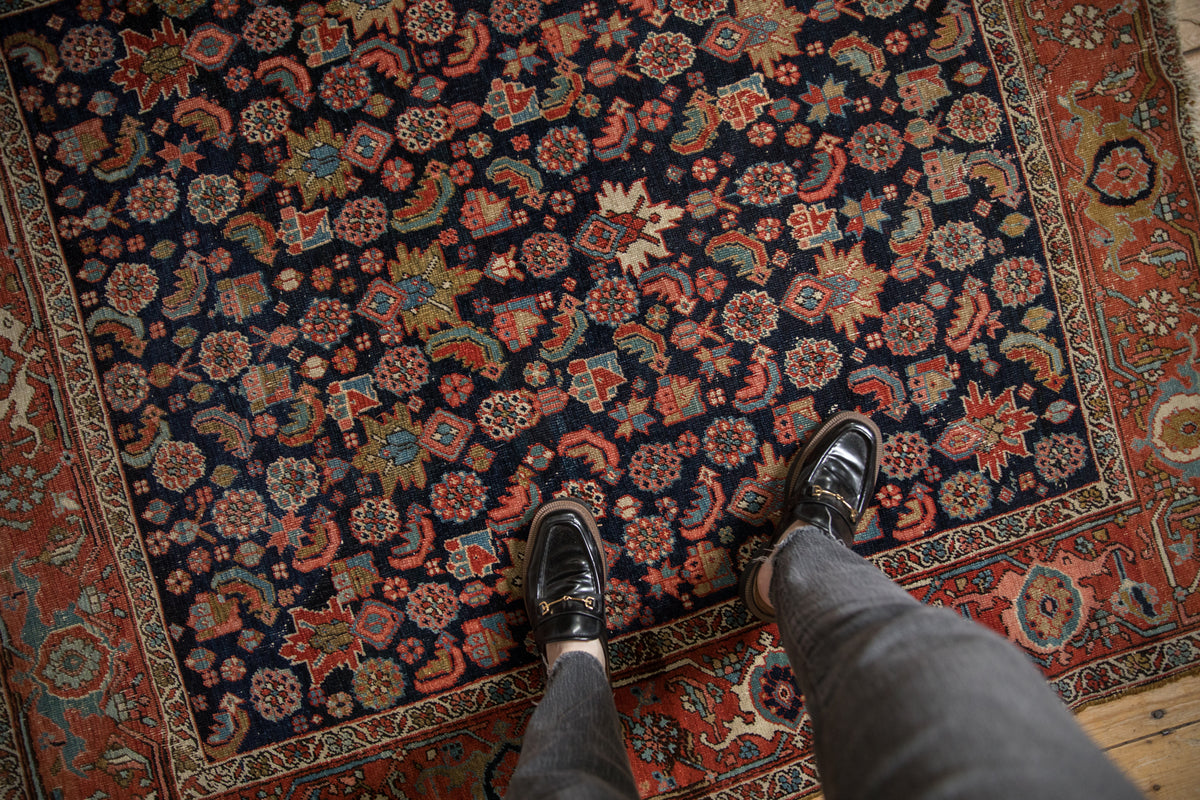 Antique Persian Heriz rug, unique allover Herati and geometric patterns, deep navy field.