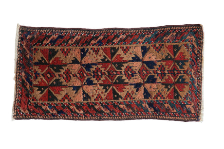 Hand-knotted Belouch rug, geometric palmettes, serpent border in camel, navy, brick red.