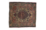 Antique Kerman square rug, elaborate floral medallion, arabesque borders, ivory, cochineal red, navy.