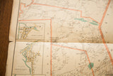 Detailed view of late 1800s map, highlighting Purdys Station and Croton Falls vignettes with light colors.