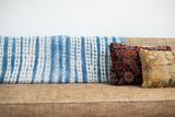 Vintage Batik Blue Throw with hand-dyed indigo and cream striped pattern.