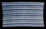 Vintage indigo blue striped textile, hand-woven cotton with varying light and dark bands.