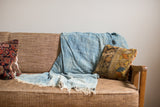 Vintage hand woven indigo batik throw, with subtle striped texture and fringed ends, 4x6.5.