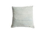 Sun-faded powder blue indigo pillow, showcasing reclaimed vintage African textile texture.