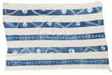 Vintage African hand-woven indigo and ivory textile throw with resist-dyed stripe patterns.