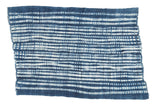 Collectible hand woven vintage African indigo throw with ivory and blue chevron stripe pattern.