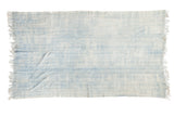 Vintage African indigo textile throw, hand woven with powder blue tones and short tassels.