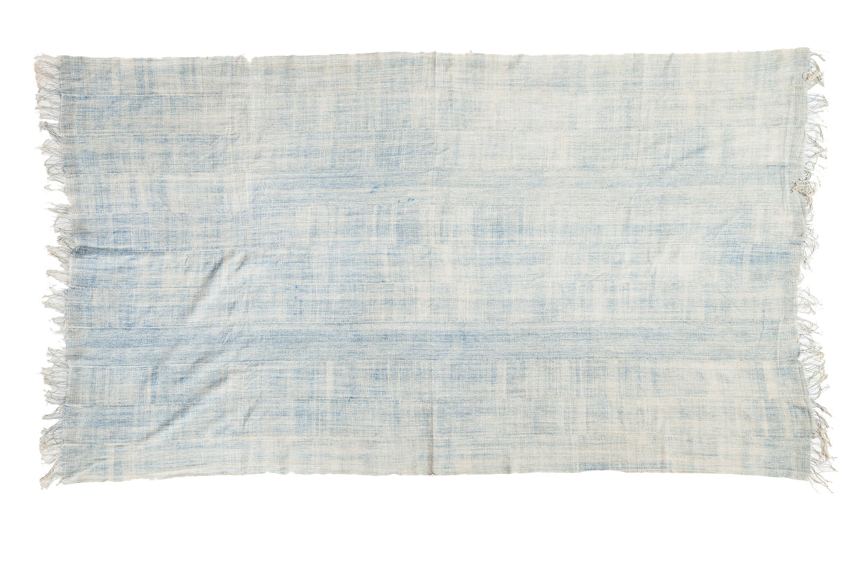 Vintage African indigo textile throw, hand woven with powder blue tones and short tassels.
