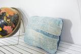 Vintage Light Blue Indigo Pillow with a sun-faded light blue and cream striped pattern.