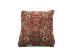 Antique Herati Bijar rug fragment pillow, featuring traditional red, blue, and ivory motifs.