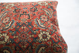 Antique Herati Bijar rug pillow fragment displaying rich ruby red and teal motifs.