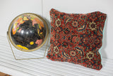 Antique Herati Bijar rug fragment pillow with intricate red pattern and sea foam linen back.